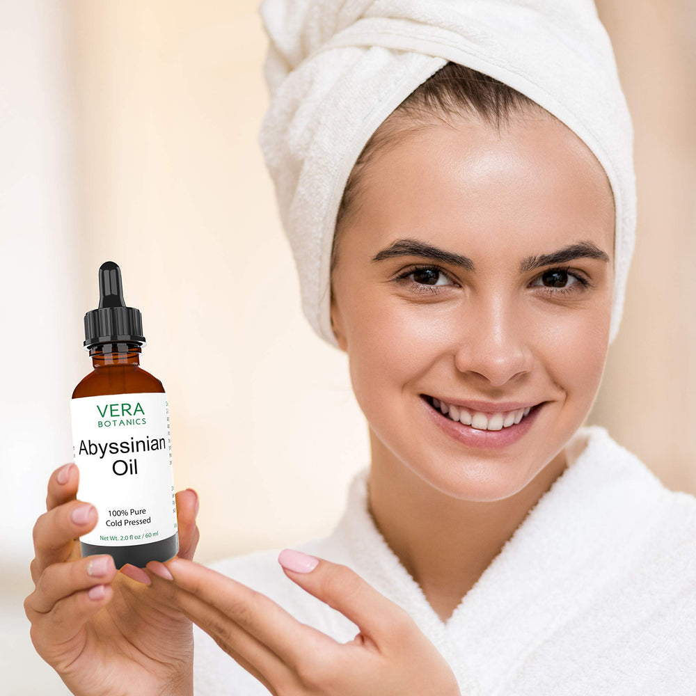 Vera Botanics Abyssinian oil on scalp and hair