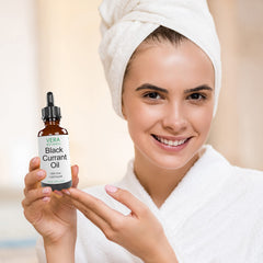 Vera Botanics Black Currant Oil applied to face for a nourished, hydrated glow