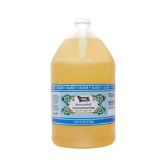 VERMONT SOAP Organics foaming hand soap dispensing in a clean bathroom.