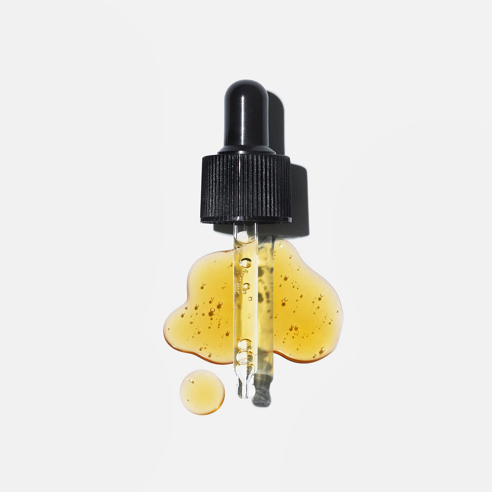 Versed Stroke of Brilliance serum swirl on skin showing quick absorption