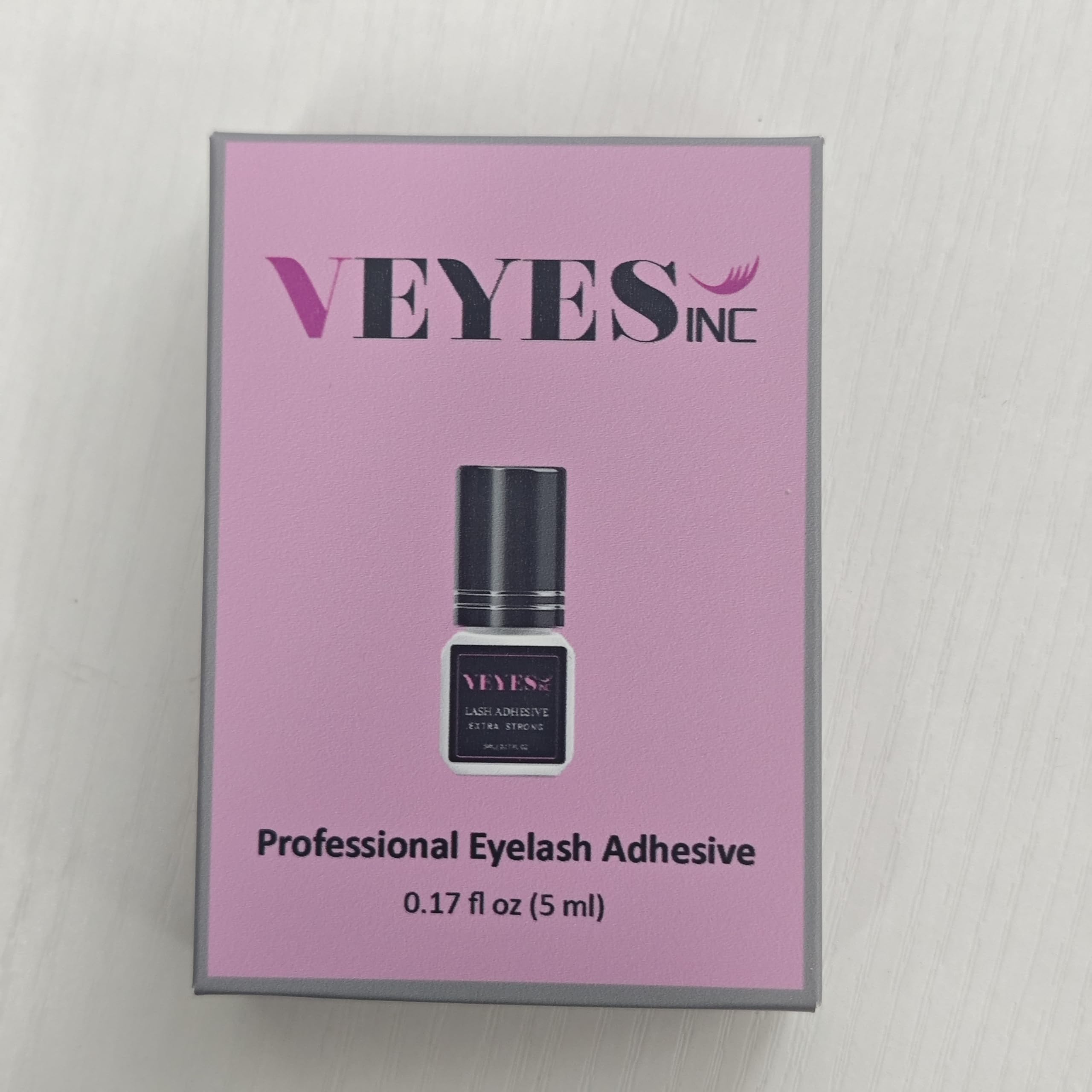 VEYES INC packaging and 5ml bottle on a tidy workstation.