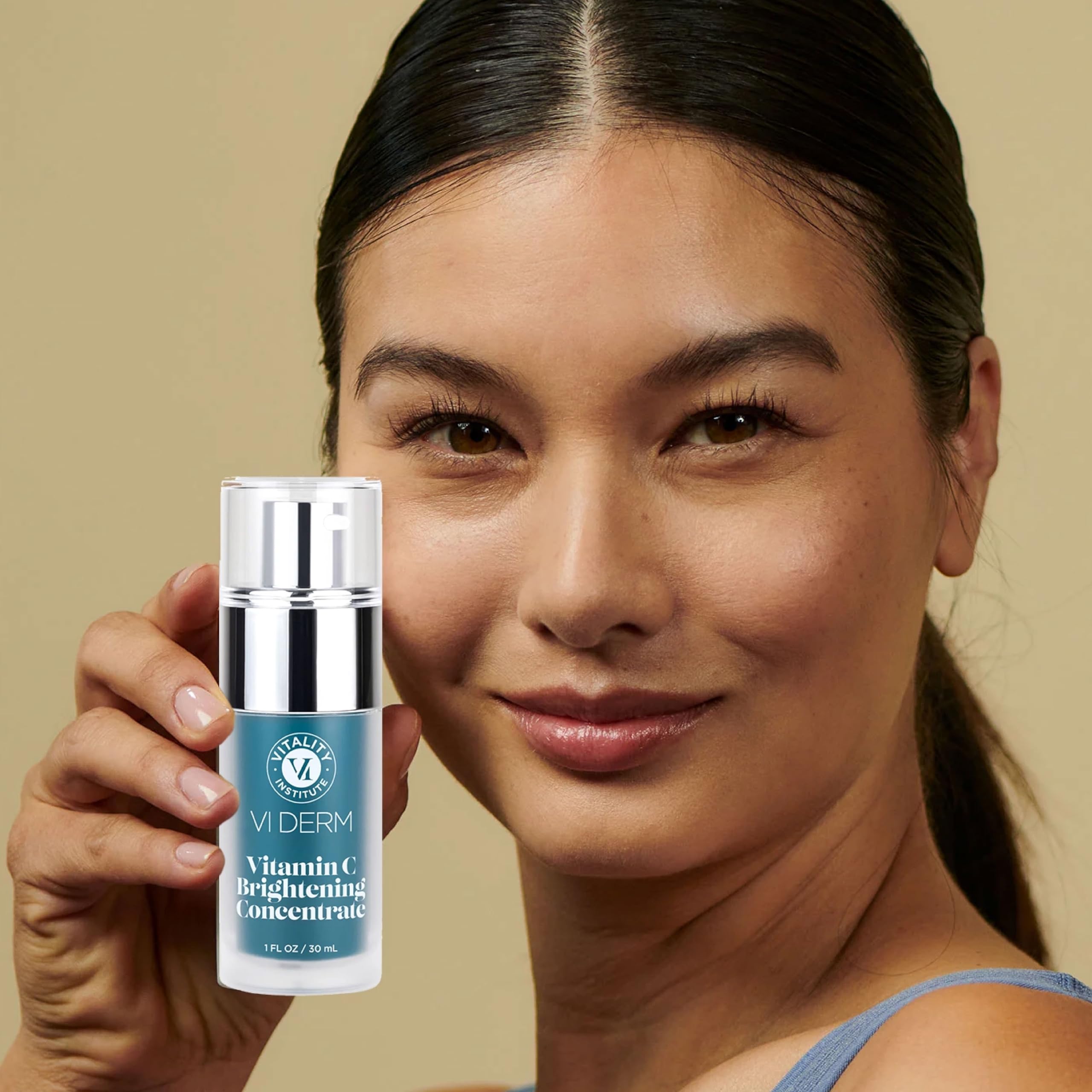 VI Derm Vitamin C Brightening Concentrate on skin shows hydration and glow.