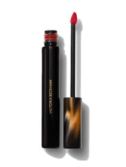 Victoria Beckham Beauty lip tint bitten-effect swatch shows natural matte color with hydration.