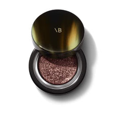 Victoria Beckham Beauty Shimmery Lid Lustre packaging close-up with protective disc preserves powder integrity.