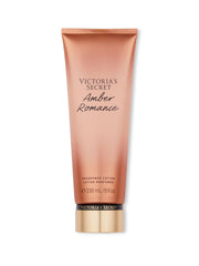 Victoria's Secret Amber Romance Nourishing Lotion bottle showing quick-dry hydration for hands and body
