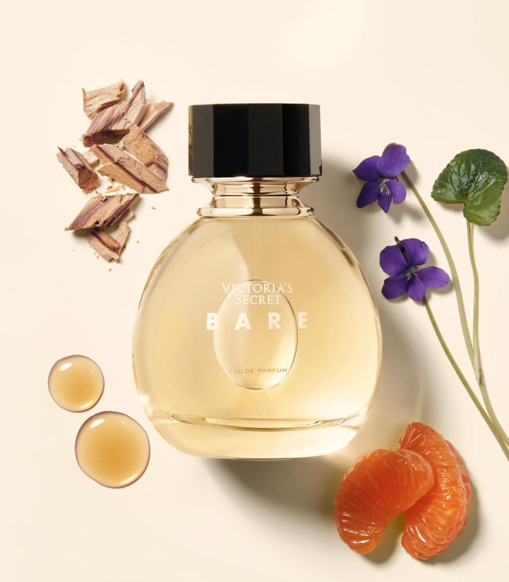 Victoria's Secret Bare fragrance mini mist label closeup shows sandalwood and violet notes.