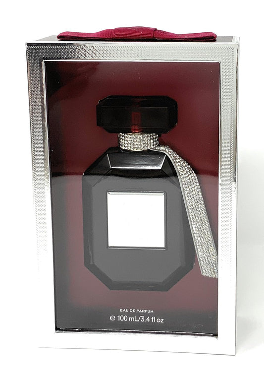 Victoria's Secret Bombshell Midnight bottle cap and atomizer highlight premium packaging