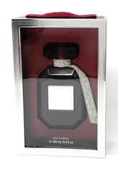 Victoria's Secret Bombshell Midnight bottle cap and atomizer highlight premium packaging