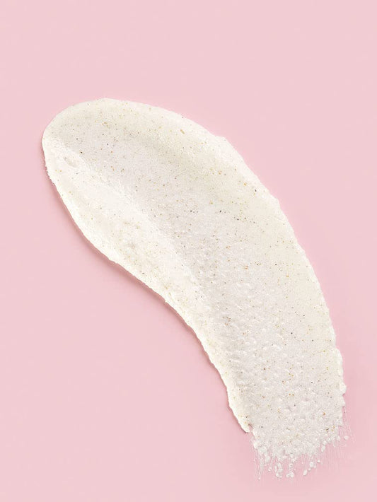 Victoria's Secret Coconut Milk and Rose Scrub texture close-up showing walnut shell exfoliants