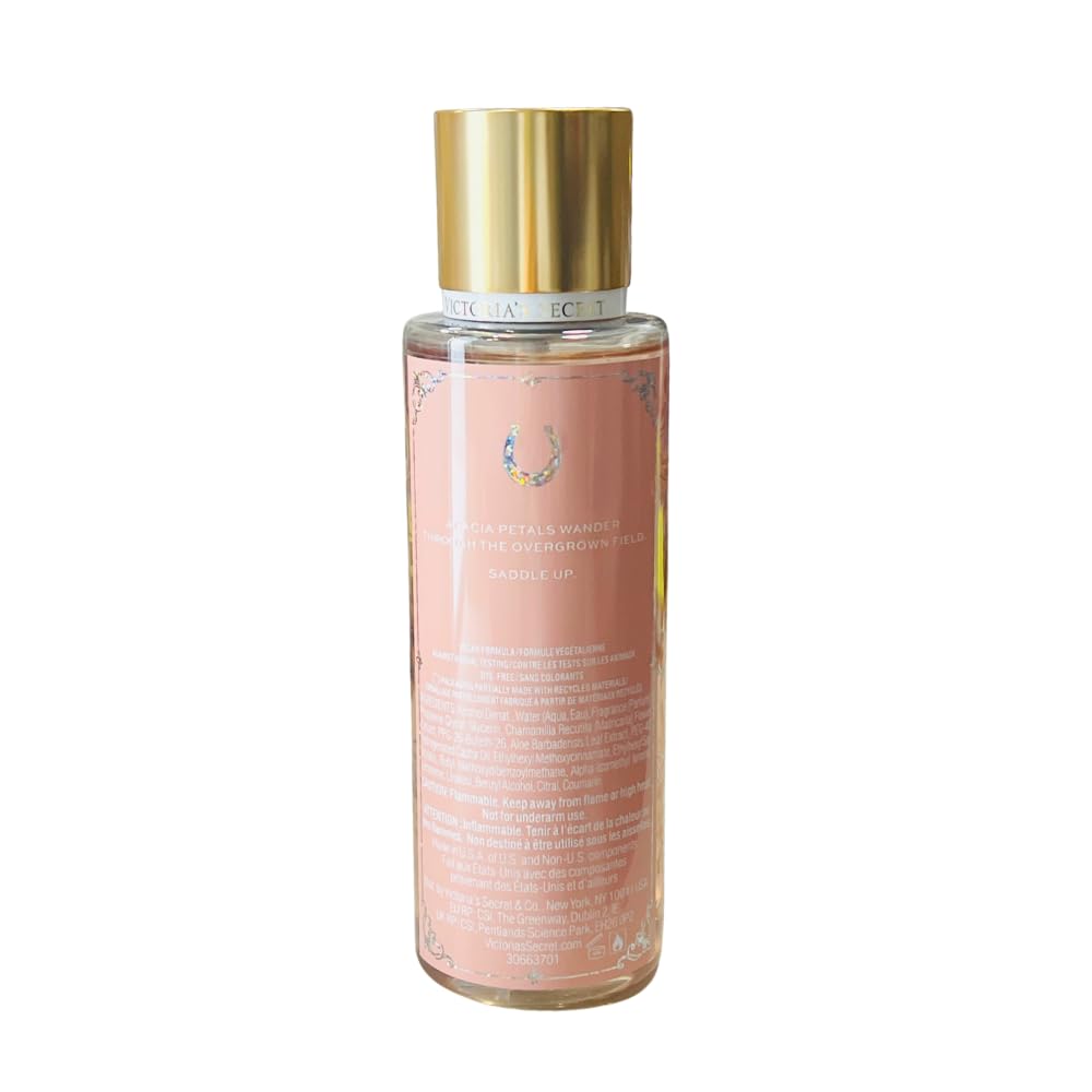 Victoria's Secret Cowgirl Texas Hold Em spray in hand for quick mood-boosting refresh.