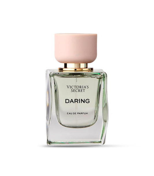 Victoria's Secret Daring bottle emphasizes oakmoss heart for earthy depth.