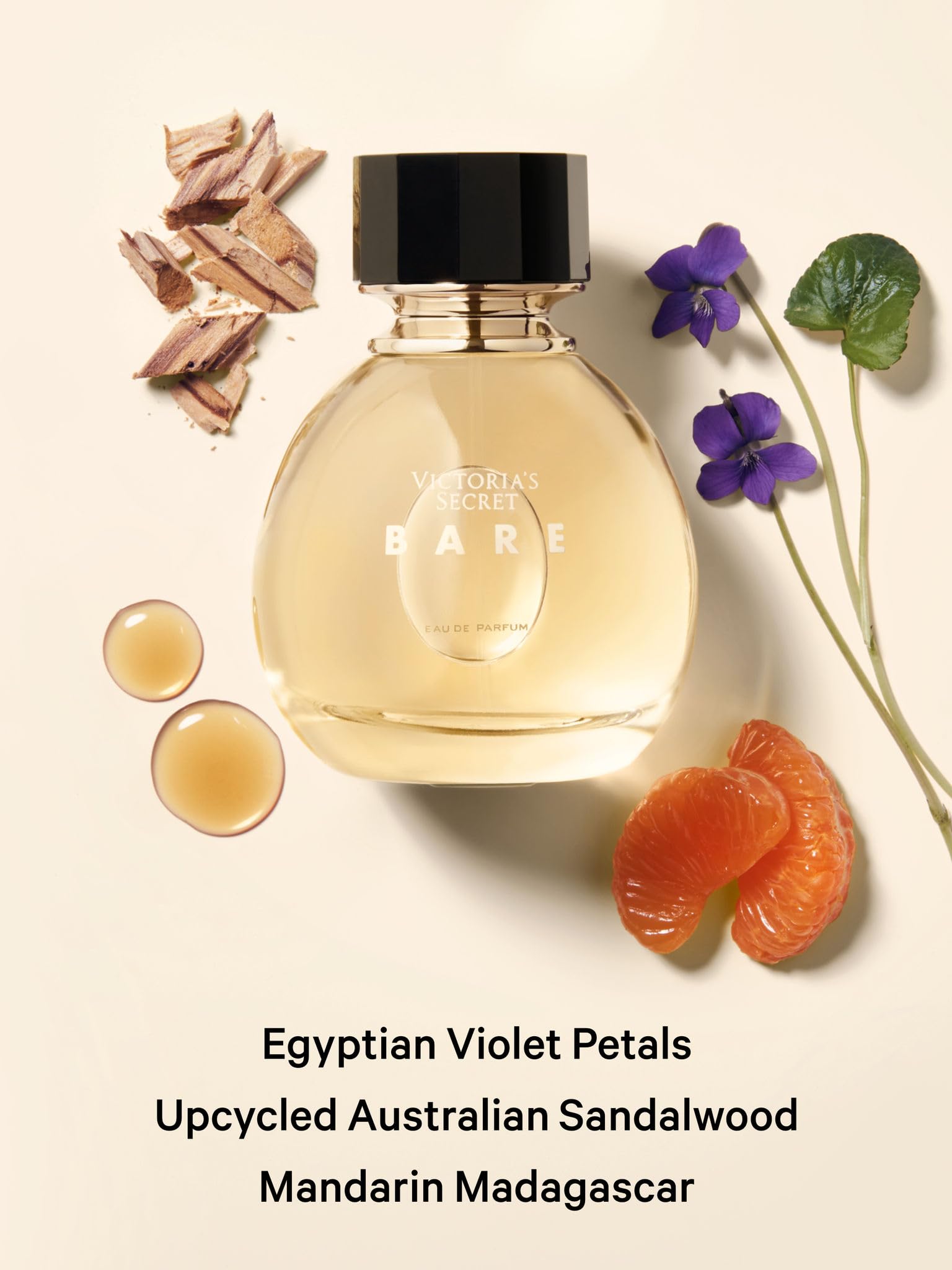 Victoria's Secret Daring mini bottle with amber woody notes for bold moments.