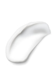 Creamy Velvet Petals Shimmer lotion being dispensed from a pump.