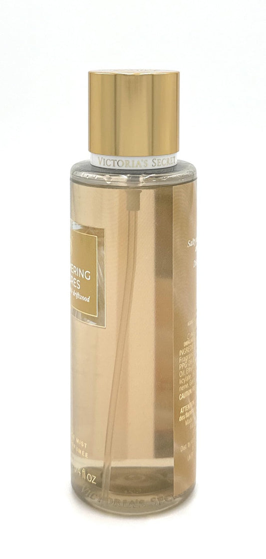 Victoria's Secret Glistening Cove Mist being spritzed for a light fragrance