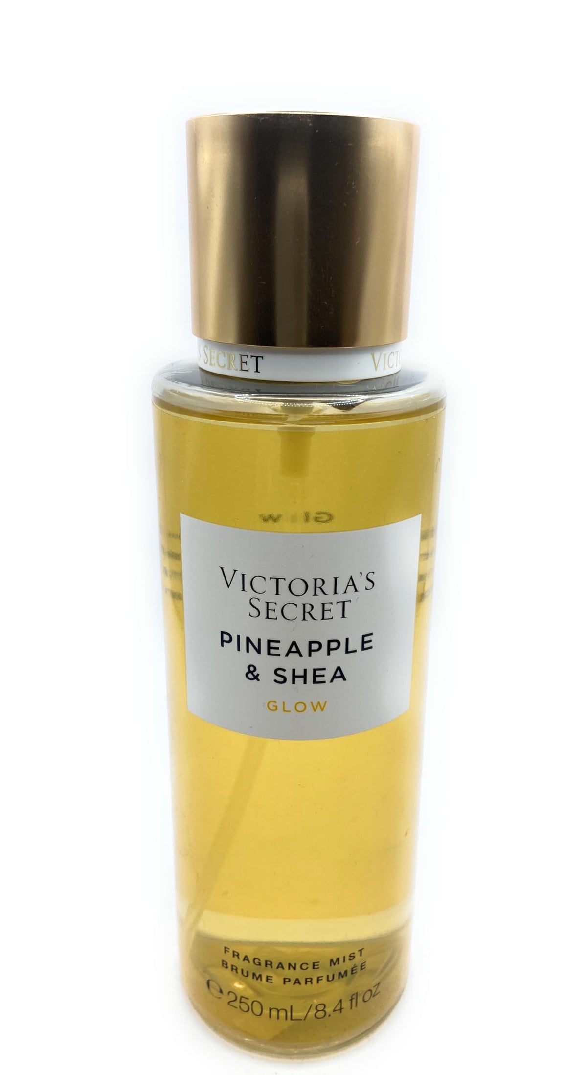 Victoria's Secret Pineapple and Shea Glow bottle front view, reviving tropical fragrance