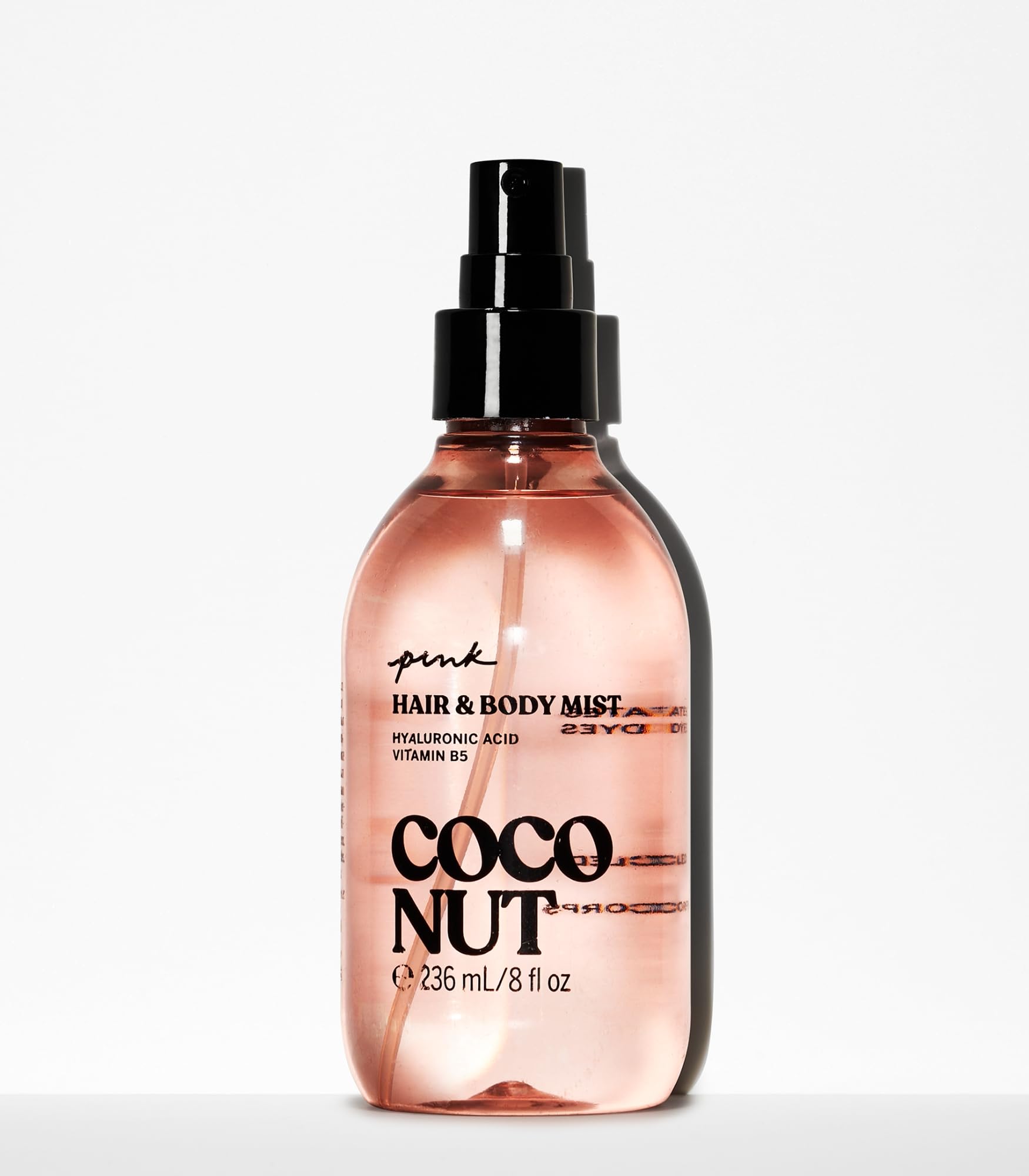 Victoria's Secret PINK Coconut Mist spray nozzle releasing a cool fragrance