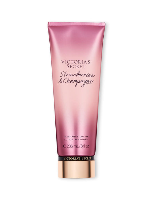 Victoria's Secret Strawberries & Champagne lotion bottle with floral fruity fragrance for daily wear.