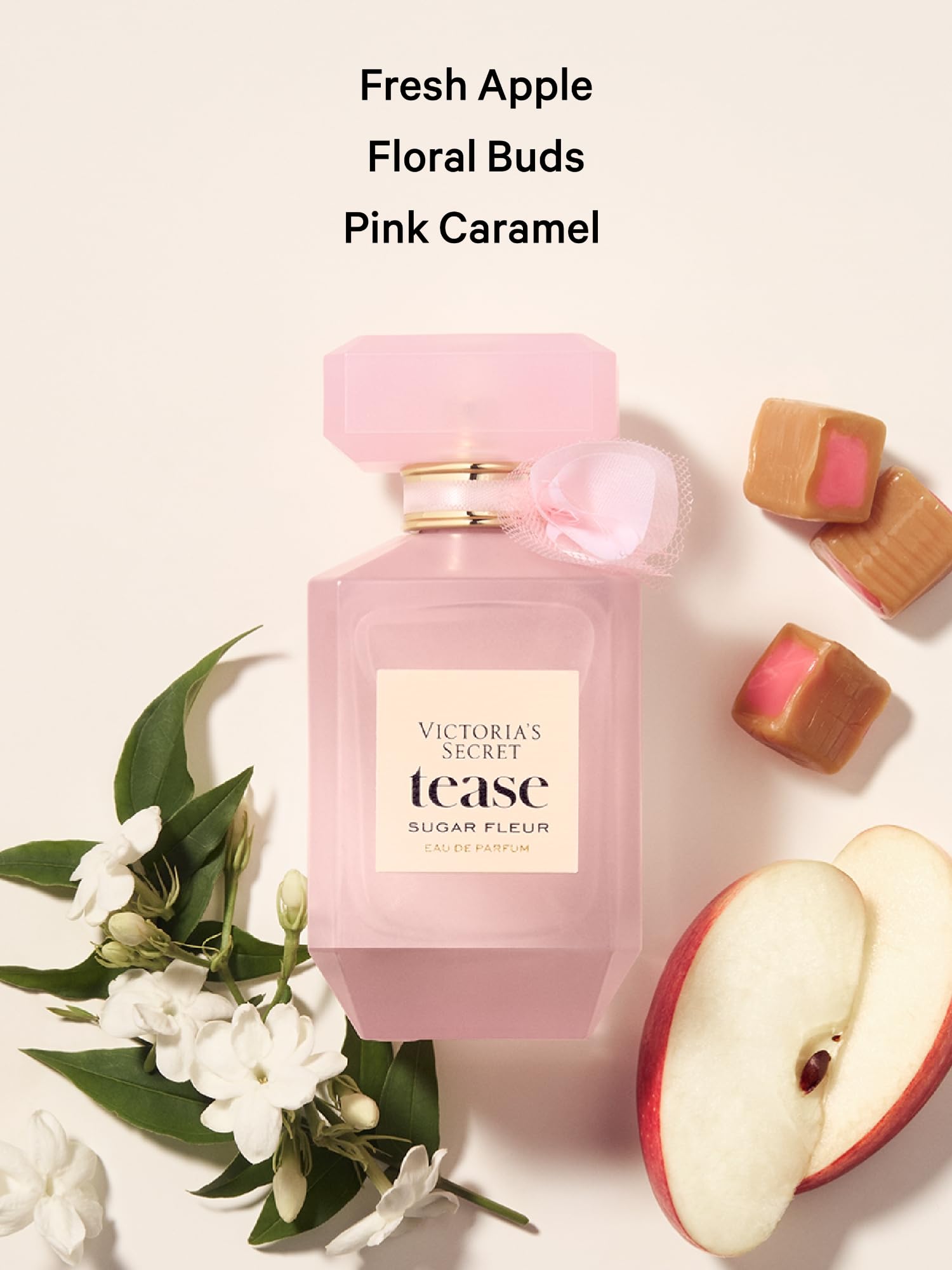 Victoria's Secret Tease Sugar Fleur bottle closeup cap emphasizes pink caramel glow.