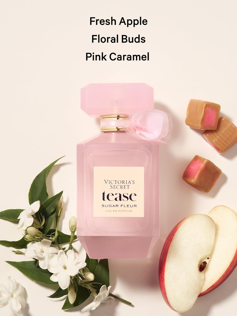 Victoria's Secret Tease Sugar Fleur bottle closeup cap emphasizes pink caramel glow.