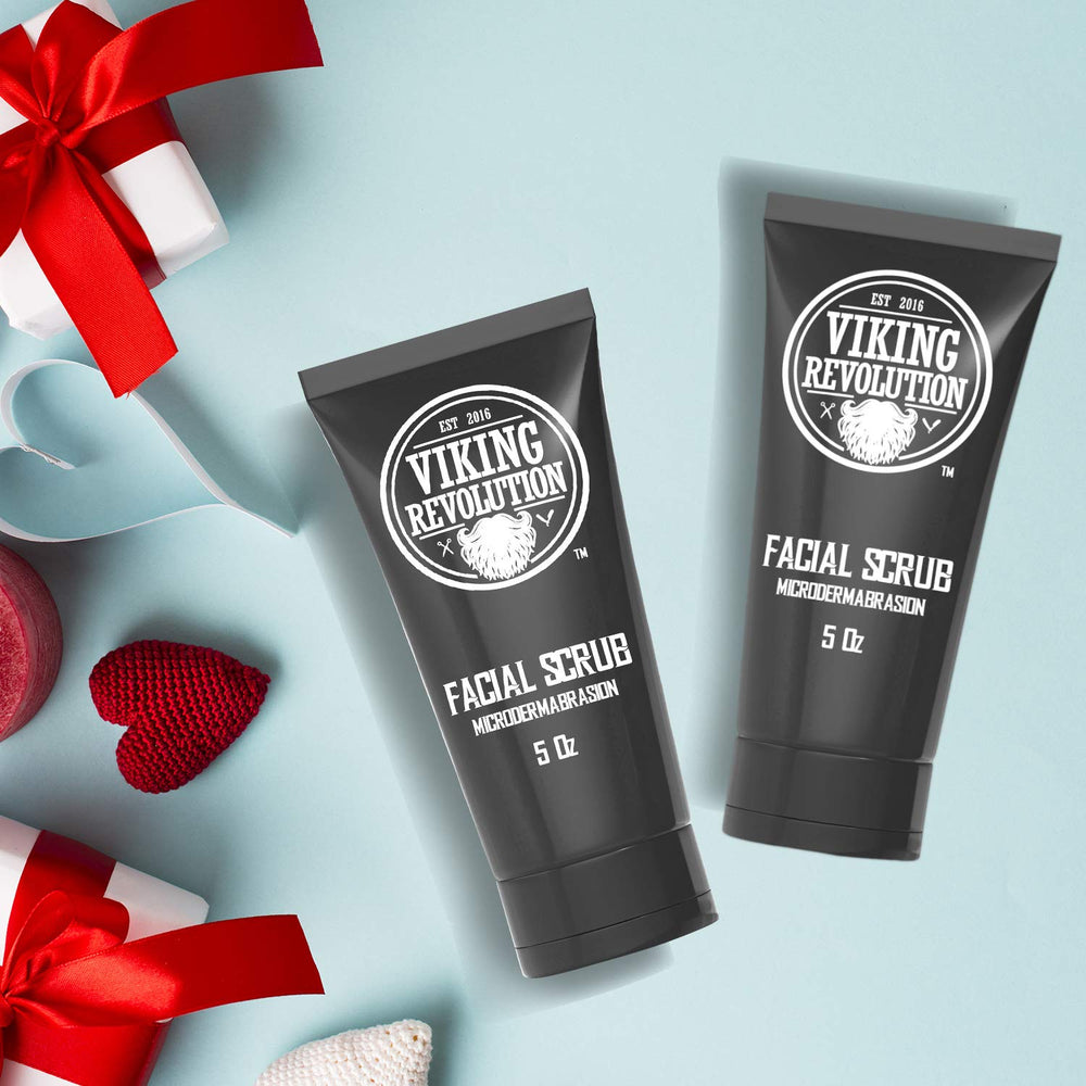 Applying Viking Revolution face scrub to skin for smoother prep before shaving.