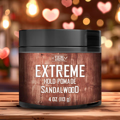 Viking Revolution sandalwood pomade jar during application for bold styling