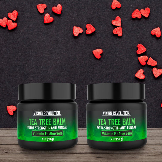 Tea Tree Oil Cream tube with label close-up highlighting natural ingredients.