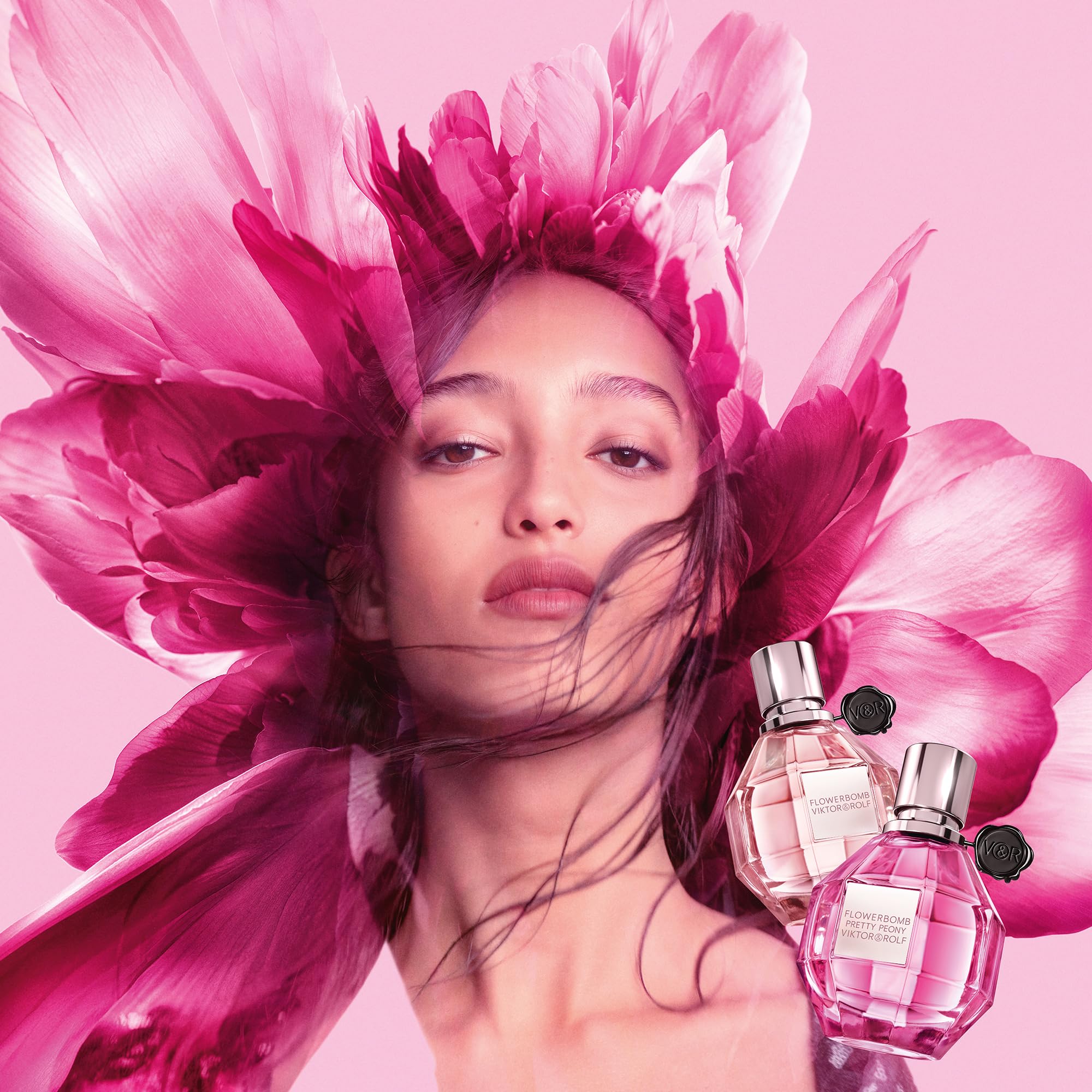 Viktor&Rolf Flowerbomb Pretty Peony on wrist suggests wearable scent.
