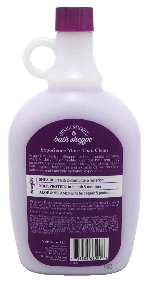 Close-up of Village Naturals Therapy label showing milk protein and vitamin E benefits