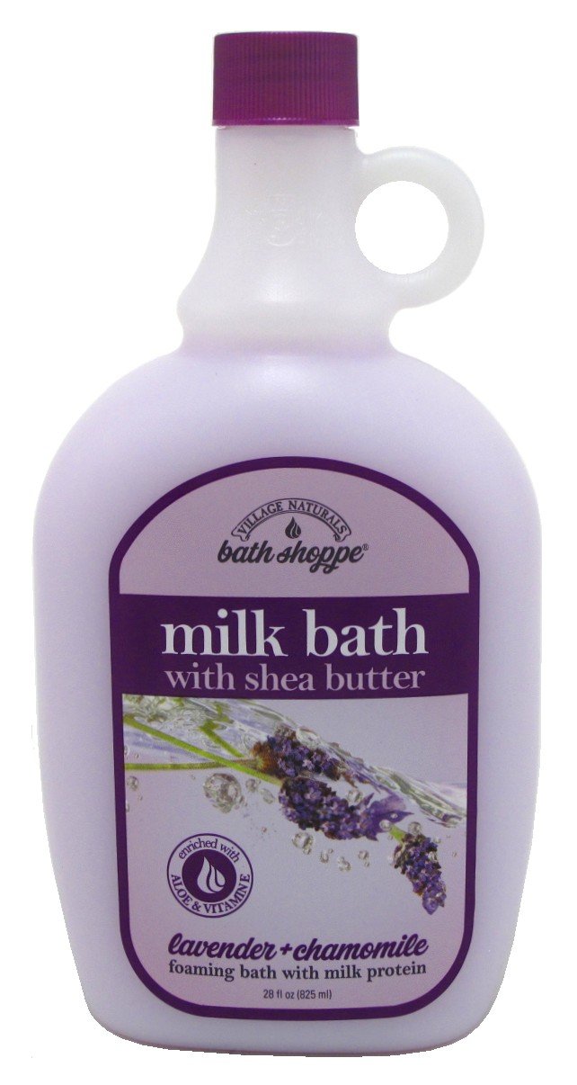 Pouring lavender bath milk from Village Naturals Therapy bottle during a relaxing soak