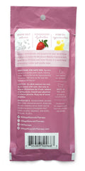 Village Naturals Therapy Glow bottle close-up highlights citrus-rose scent and nourishing minerals.