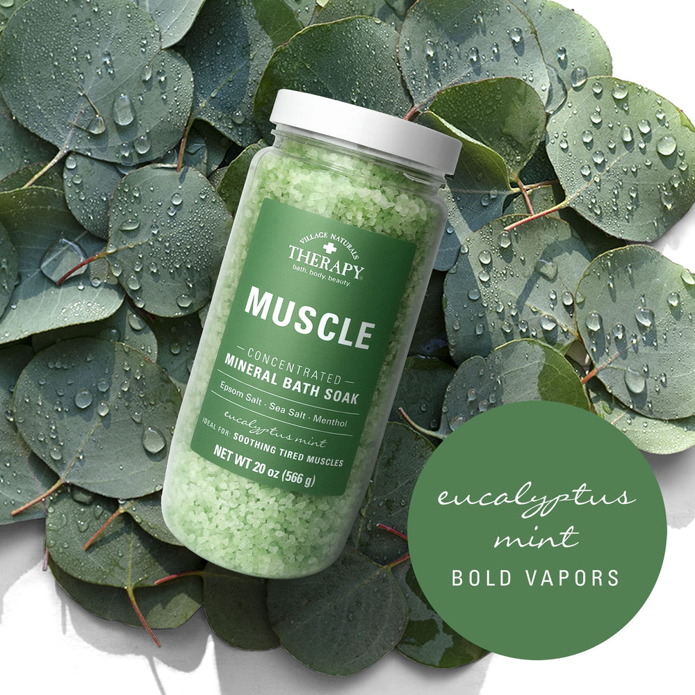 Village Naturals Therapy bottle and labels closeup conveys trusted branding.