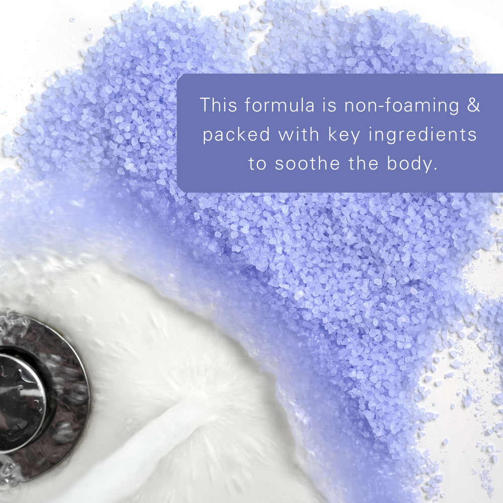 Village Naturals Therapy bath in warm water for a calming full soak.