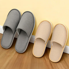 Vipay gray L disposable slippers in sealed packaging for hotel guests.