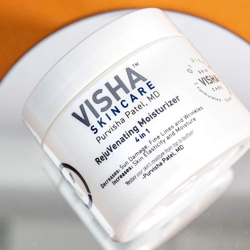 Applying Visha Rejuvenating Moisturizer to face for gentle hydration