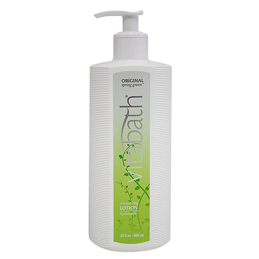 Vitabath Original Spring Green bottle pour showing easy, non-greasy hydration for dry skin.