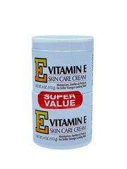 Vitamin E Skin Care Cream 4oz jar being spread to reveal rich moisture