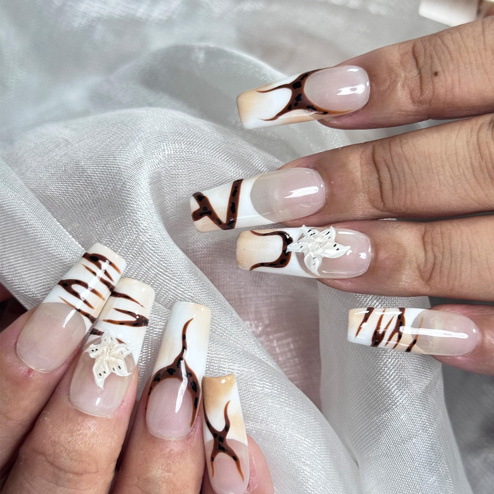Vlazryk French-tip nails with a salon-quality finish for crisp, natural-looking tips.