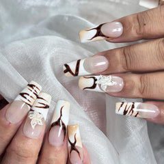 Vlazryk French-tip nails with a salon-quality finish for crisp, natural-looking tips.