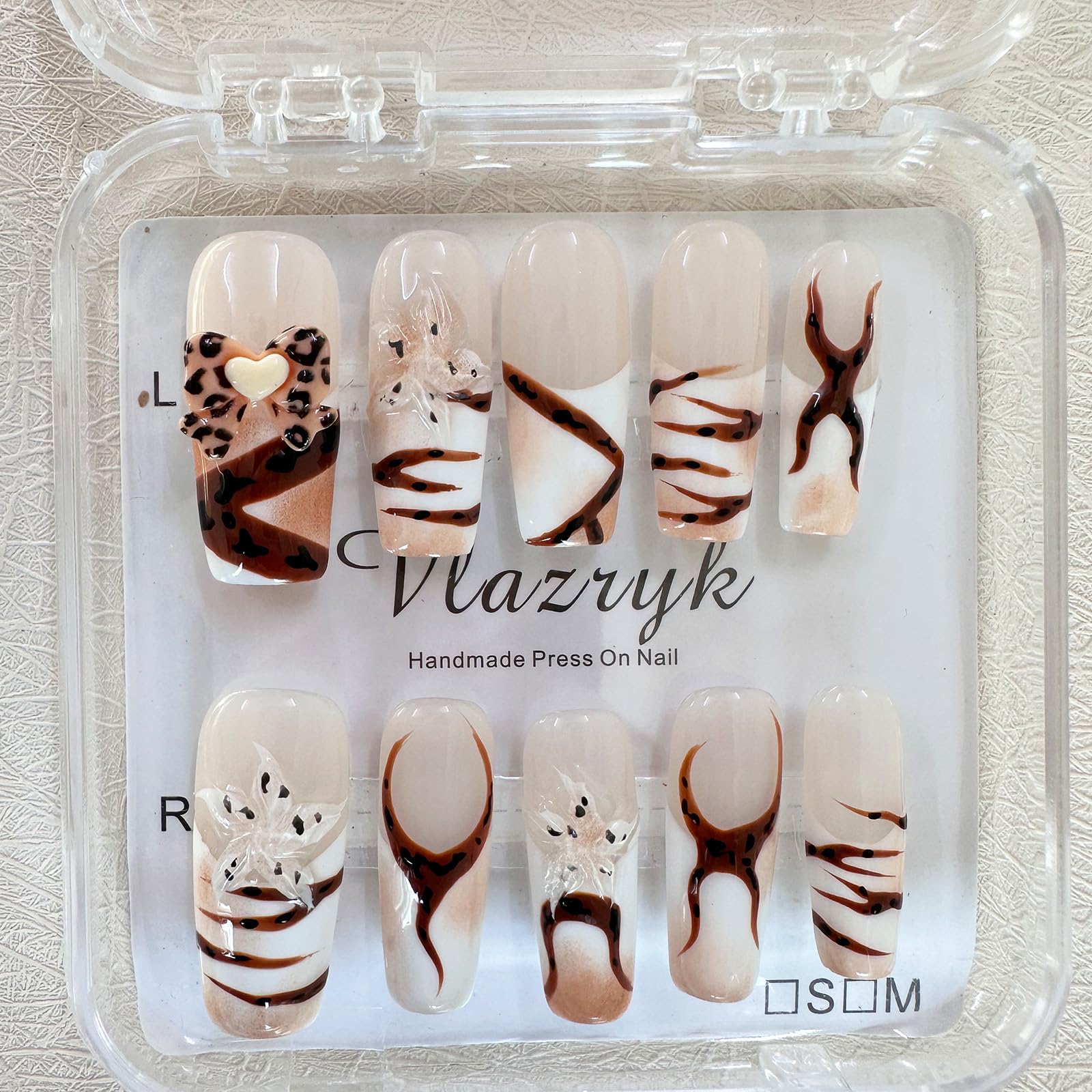 Vlazryk nail-kit components including jelly stickers for simple home application.