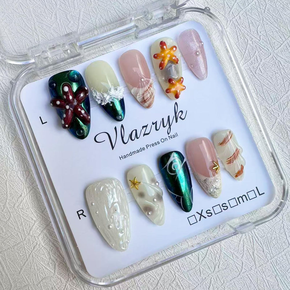 Vlazryk Seabed World nails with mermaid chrome and pearl shell for sea-inspired look