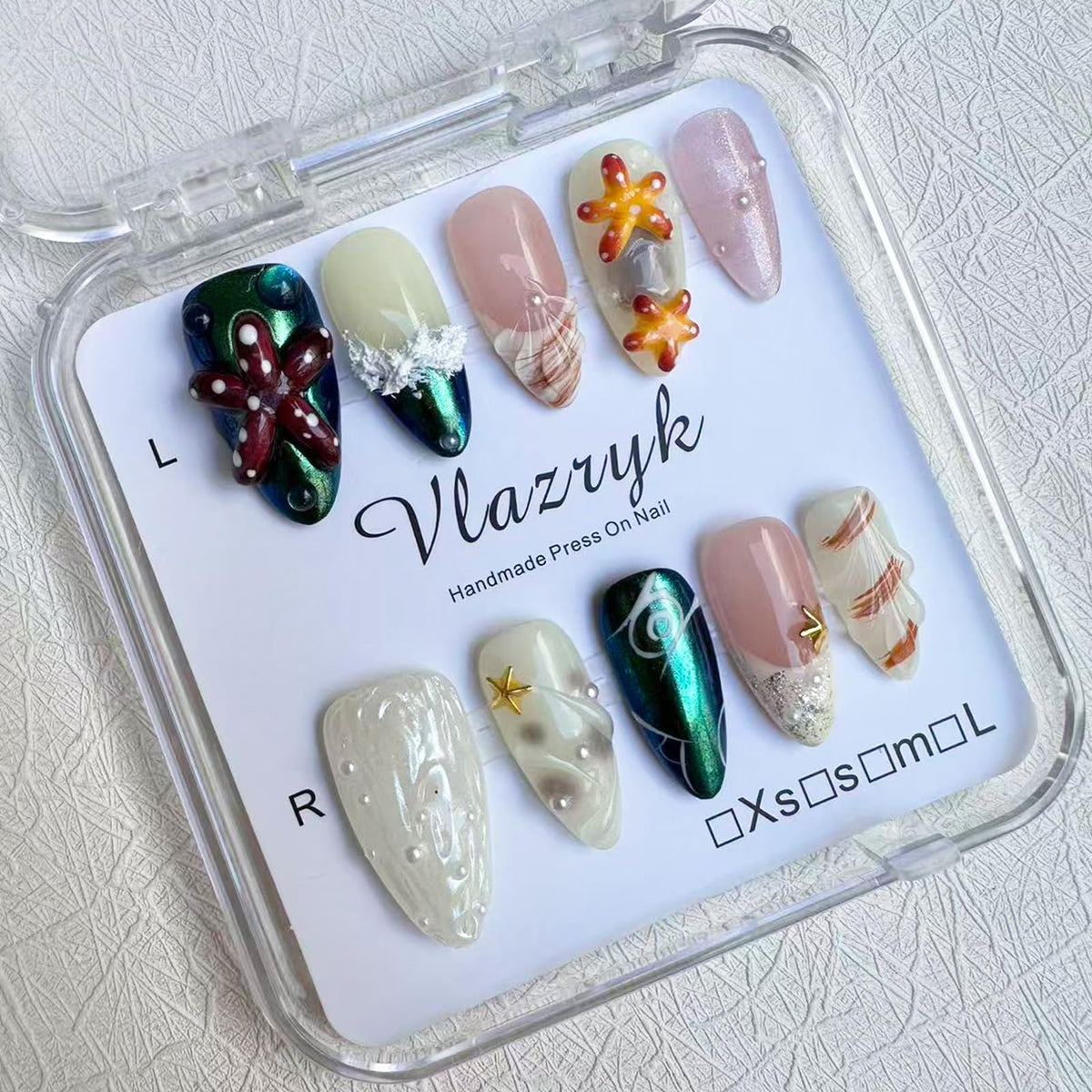 Vlazryk Seabed World nails with mermaid chrome and pearl shell for sea-inspired look