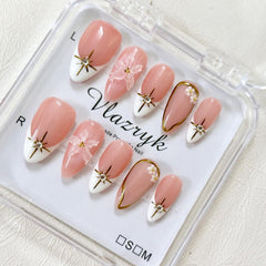 Vlazryk short brown French tip nails with 3D rhinestones for chic, durable wear.
