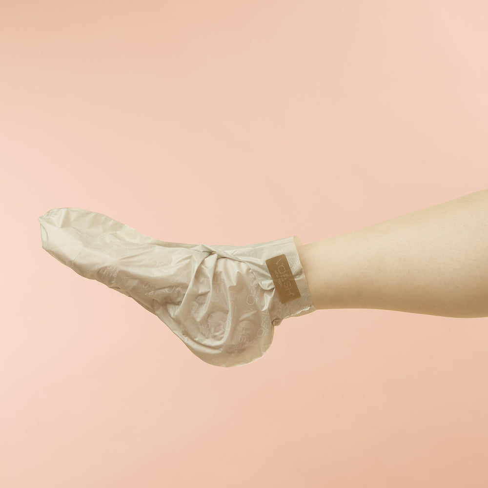 VOESH Collagen Socks removable toe tips enable nail painting during treatment.
