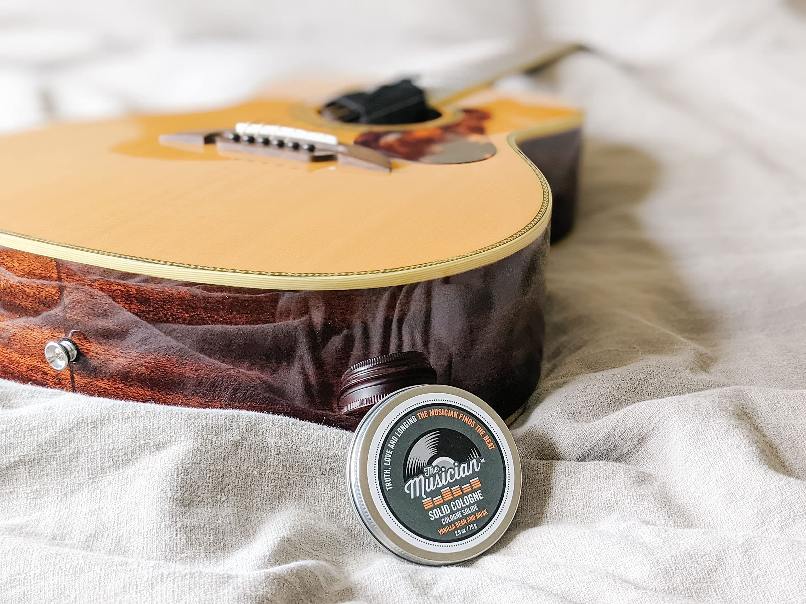Walton Wood Farm The Musician solid cologne tin design protects product during trips.