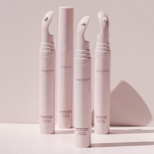 Wander Beauty Baggage Claim Eye Cream applicator in use for precise application