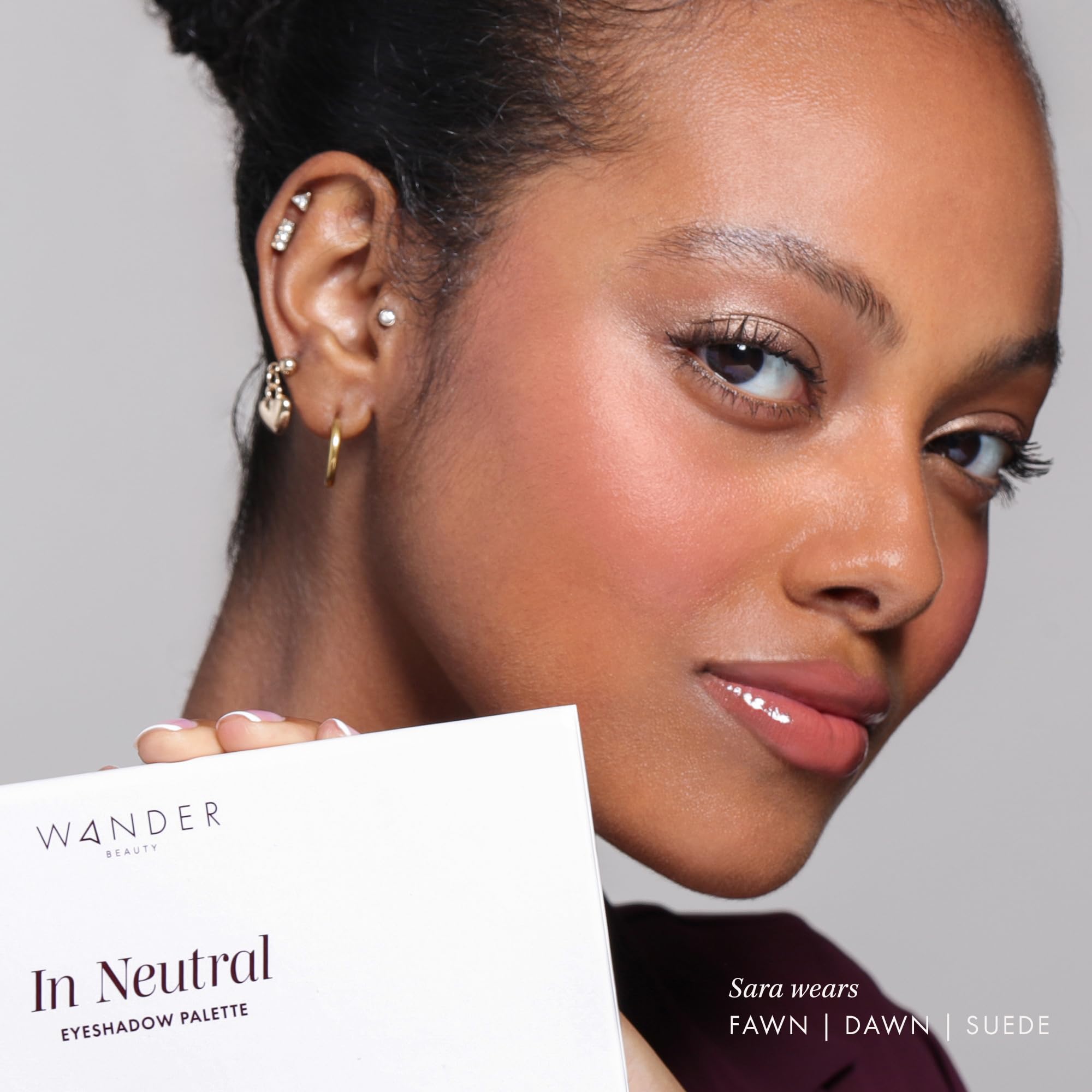 Wander Beauty In Neutral Latte swatch highlights rich mahogany tone.
