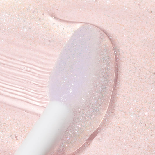 Wander Beauty Lip Retreat Oil Oasis Glow applicator swatch showing a glossy tint