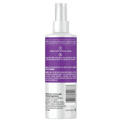 Waterless Heat Shield spray-dispensing mist ideal for quick touch-ups on the go.