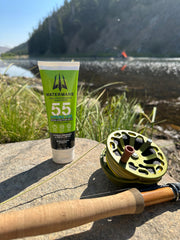 Waterman's Hydro Lite sunscreen being applied on skin, lightweight and quick-absorbing.