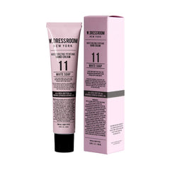 W.Dressroom Moisturizing Hand Cream travel-size bottle for on-the-go hydration.